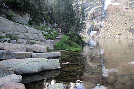 Black Lake with the trail crossing rocks